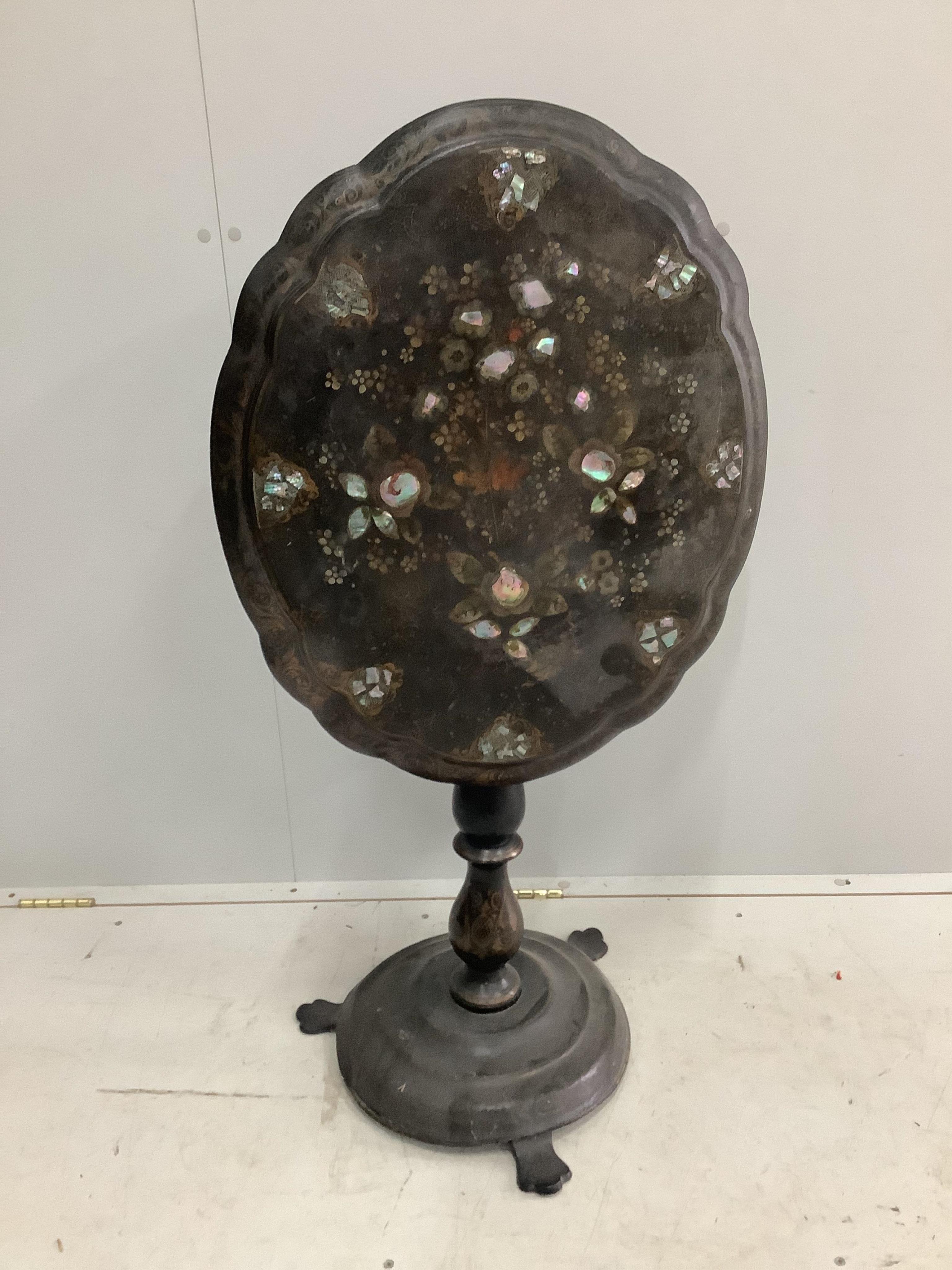 A Victorian mother of pearl inlaid painted papier mache tilt top table, width 64cm, depth 53cm, height 69cm. Condition - poor to fair